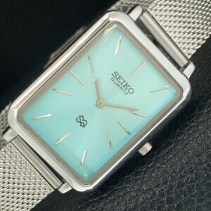 Vintage Style Seiko Quartz Mens Silver Watch & Blue accents W/ Steel Strap